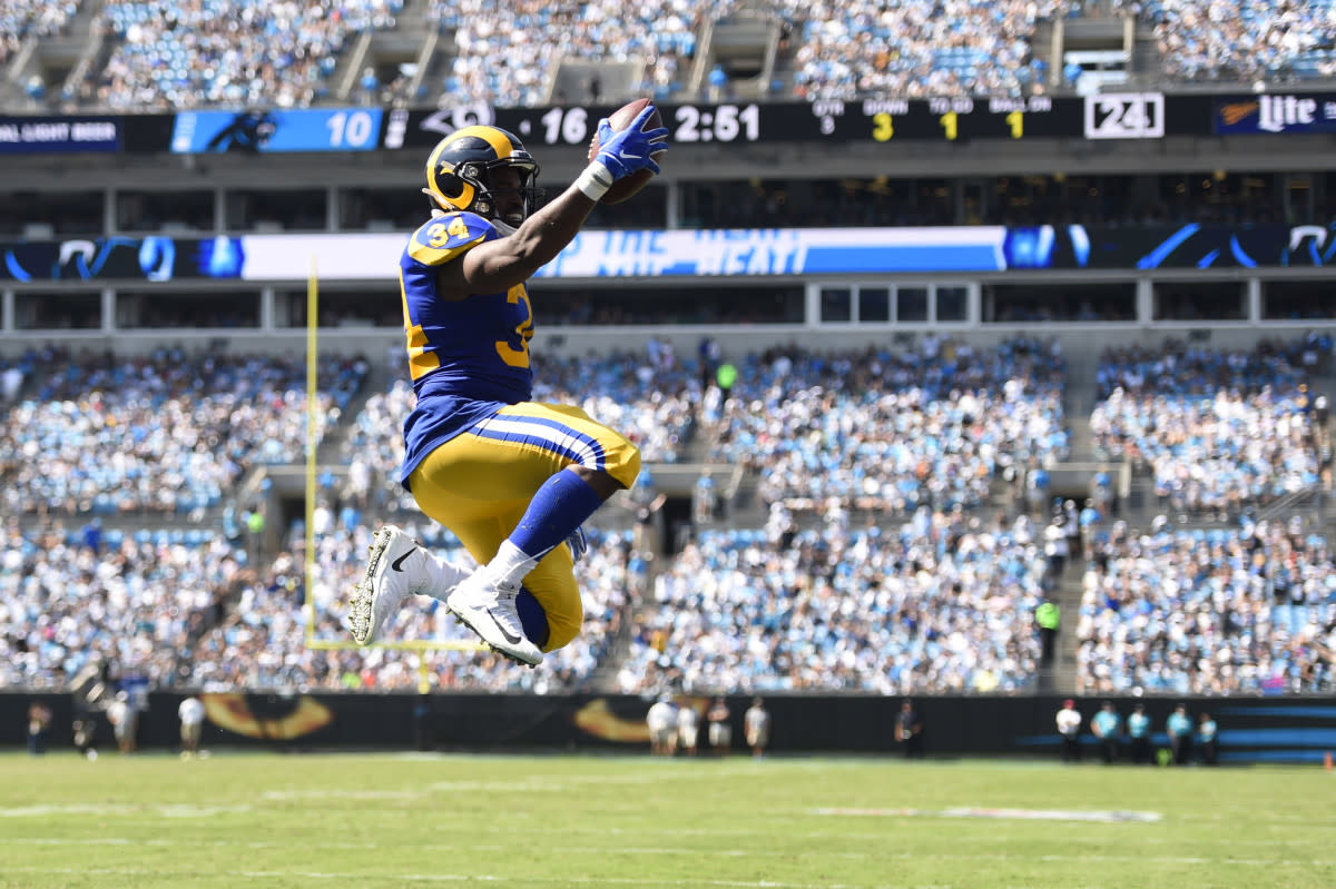 Rams running back Malcolm Brown scores a touchdown in the third quarter at Bank of America Stadium in a 2019 game.